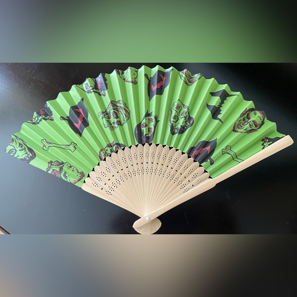 Collectors Pinup Girl Clothing Monster Print Green and Black Fan